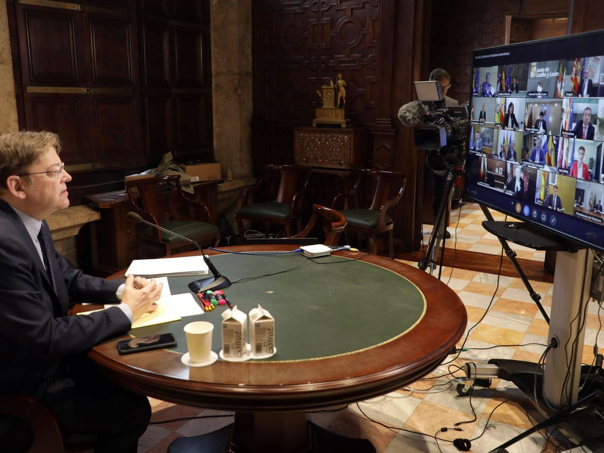 Foto: Ximo Puig, en una videoconferencia con Sánchez y presidentes autonómicos. (EFE)