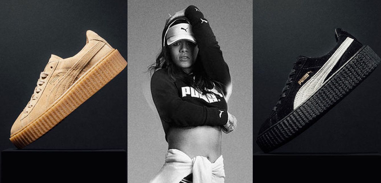 La cantate Rihanna posa junto a algunos de sus diseños para la colección especial de Puma 