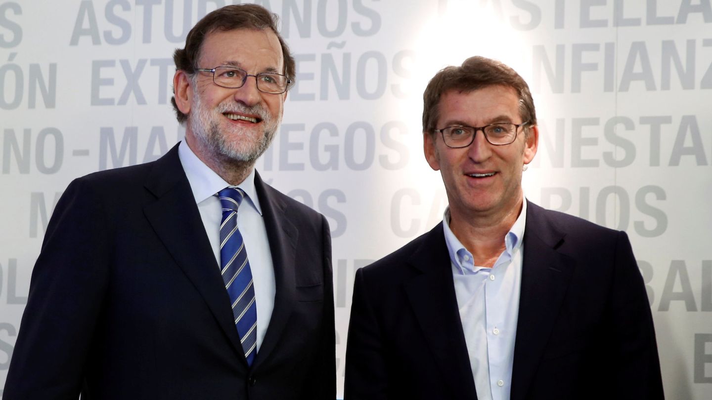 Alberto Núñez Feijóo y Mariano Rajoy. (Reuters)