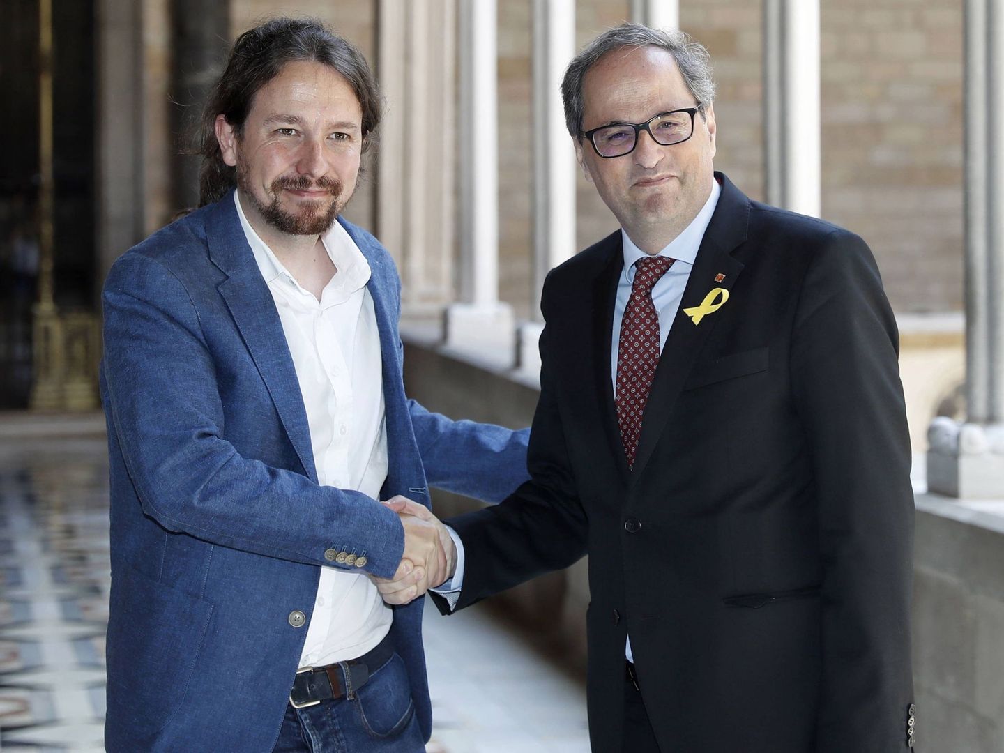 El presidente catalán, Quim Torra, y el secretario general de Podemos, Pablo Iglesias. (EFE)