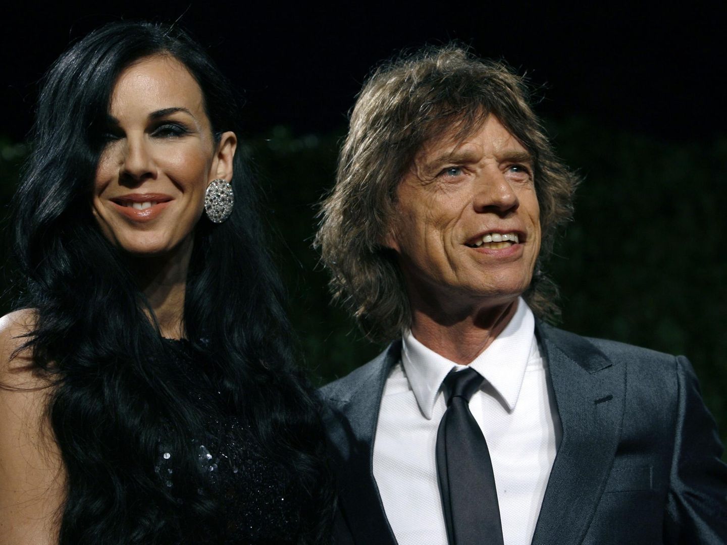 L'Wren Scott y Mick Jagger, en 2009. (Reuters)