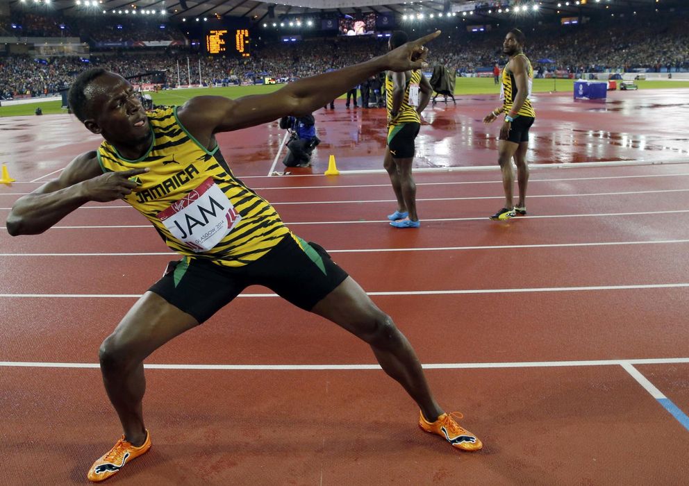 Foto: Bolt celebra la victoria con su pose habitual de campeón (Reuters). 