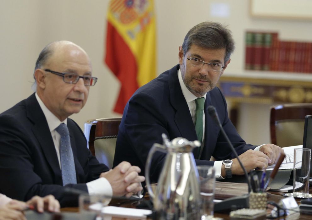 Foto: El nuevo ministro de Justicia, Rafael Catalá Polo (d), y Cristóbal Montoro (EFE)