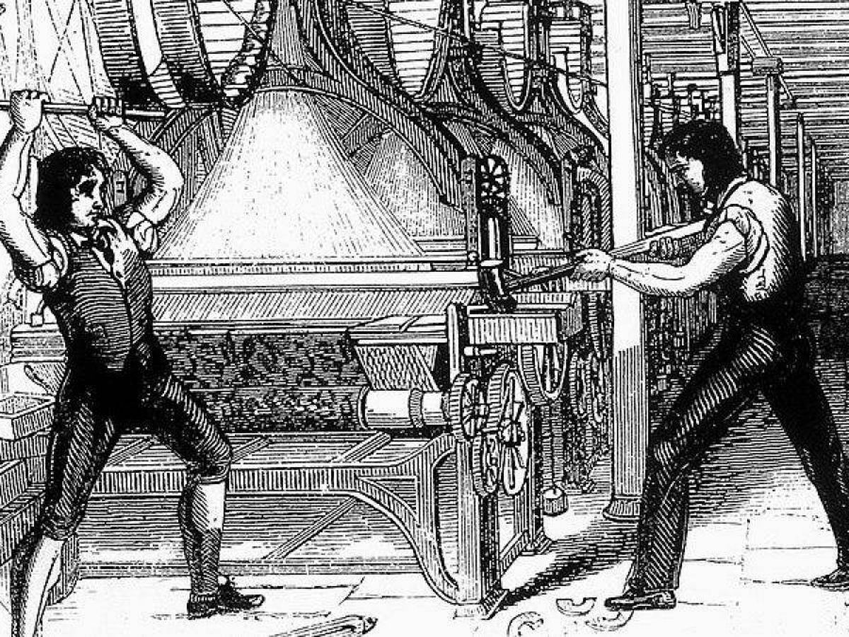 Foto: Obreros destrozan máquinas de hilar en la Revolución Industrial. (Dominio público)