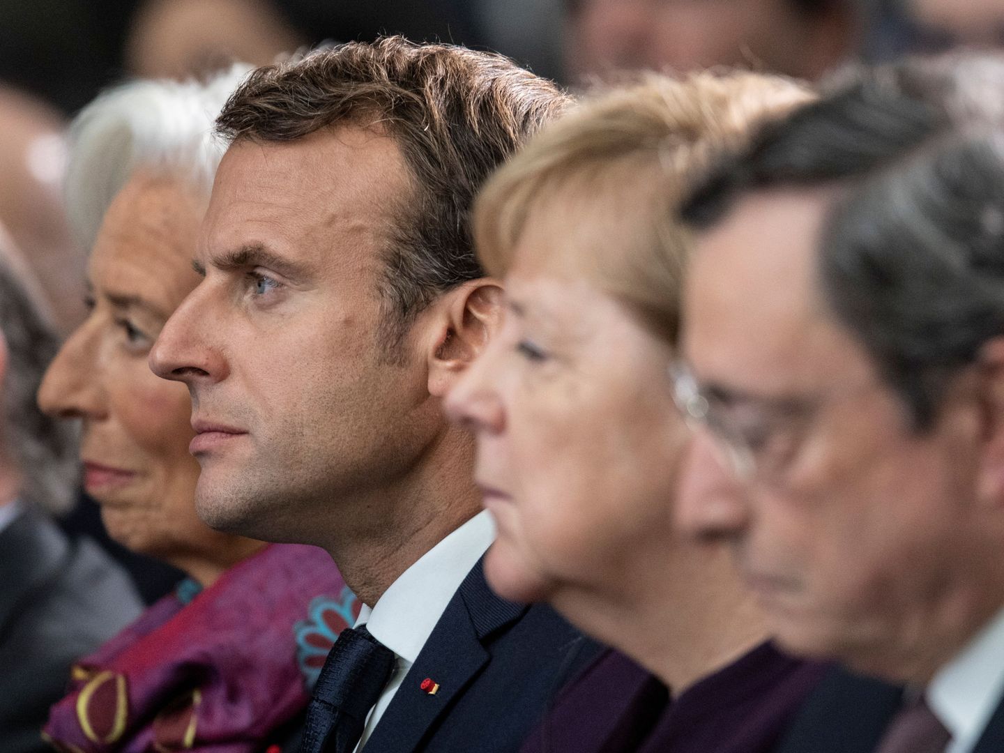 De i a d, Christine Lagarde, Emmanuel Macron, Angela Merkel y Mario Draghi, en Fráncfort. (Reuters)