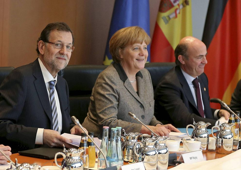 Foto: Angela Merkel, Mariano Rajoy y Luis de Guindos (EFE)