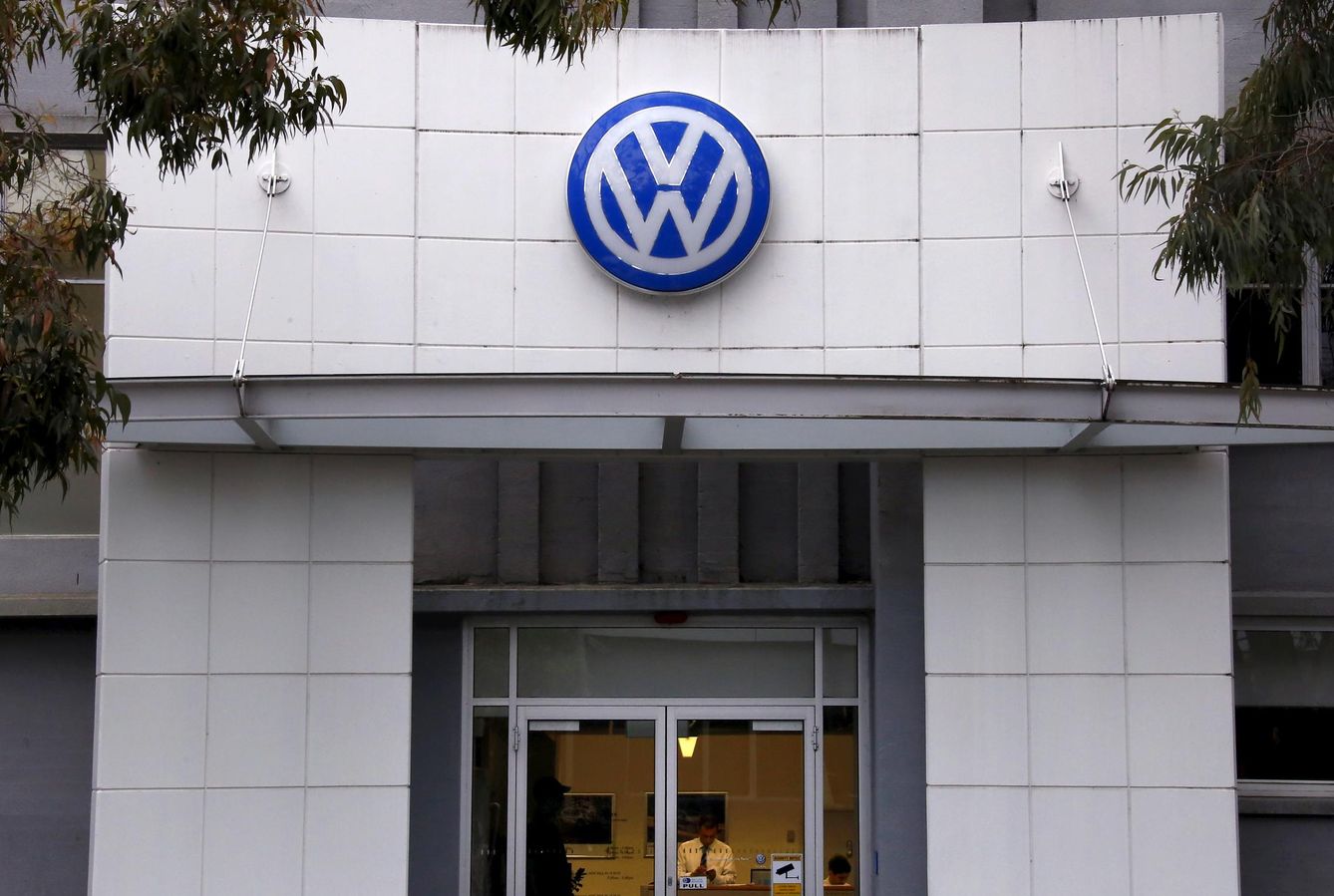 An employee stands behind the counter at a volkswagen service center for the german automaker located in sydney
