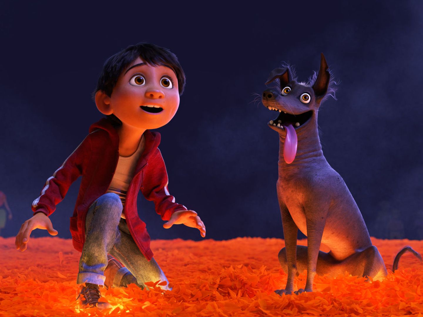 Fotograma de la película 'Coco' con el protagonista, Migue y su perro Dante (EFE)