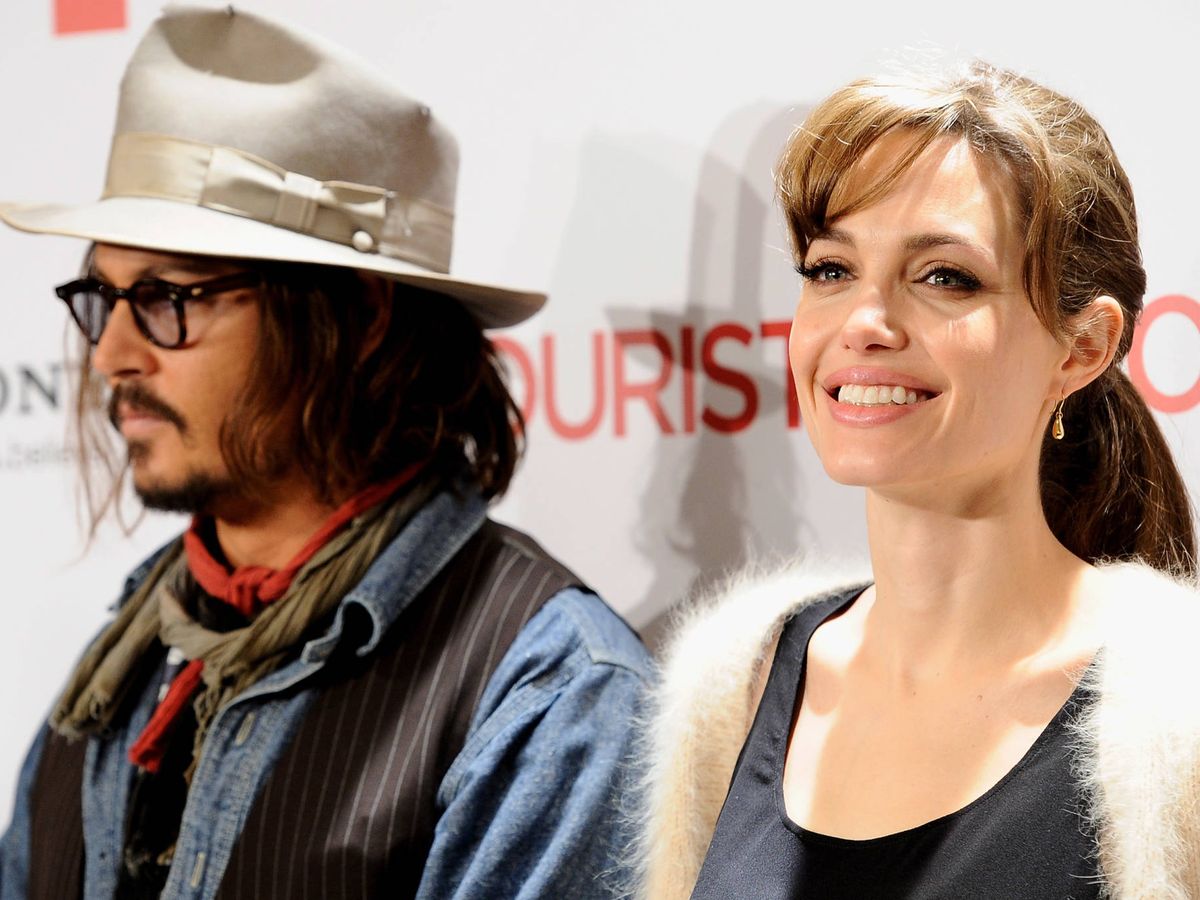 Foto:  Johnny Depp y Angelina Jolie, en el estreno en Madrid de 'The tourist'. (Getty)