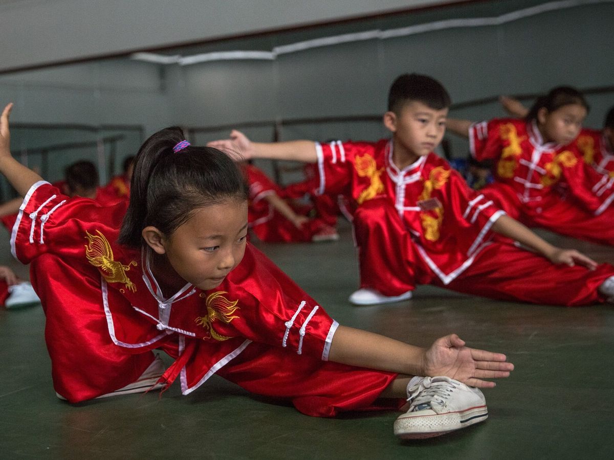 Foto: Varios niños practican taichi en el condado de Gu'an County, cerca de Pekín. (EFE)