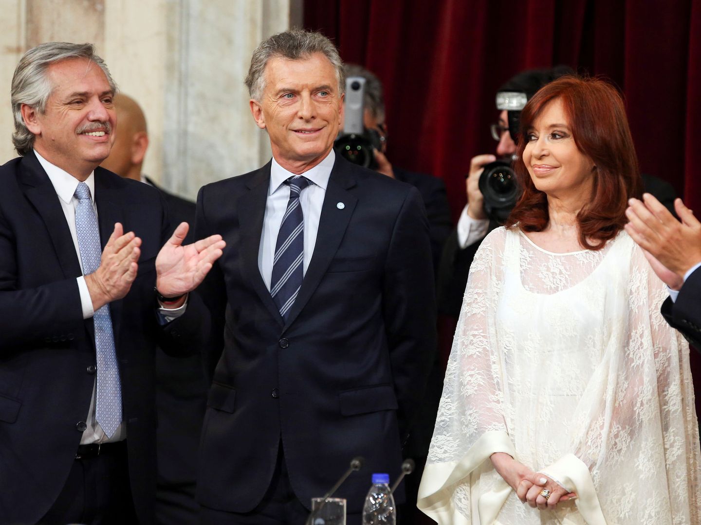 Fernández, Macri y Fernández. (Reuters)  