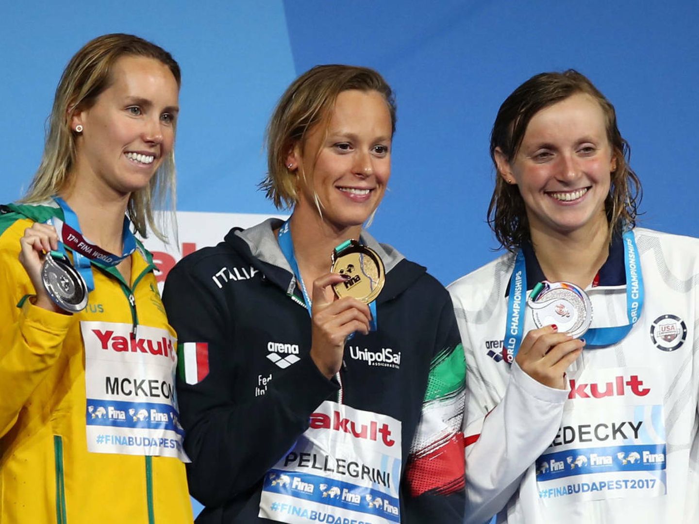 Swimming – 17th FINA World Aquatics Championships – Women's 200m Freestyle awarding ceremony – Budapest, Hungary – July 26, 2017 – (L-R) Emma McKeon (silver) of Australia, Federica Pellegrini (gold) of Italy and Katie Ledecky (silver) of the U.S. pose with the medals. REUTERS Michael Dalder