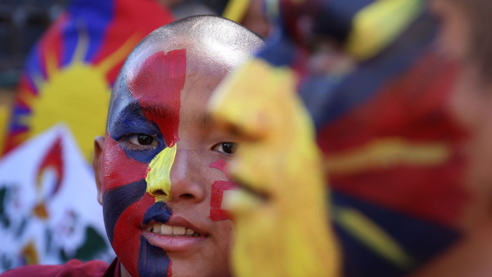 Foto: Exiliados tibetanos en Dharamsala, India, participan en una marcha de paz durante el 60º aniversario del Alzamiento Nacional del Tíbet. (EFE)