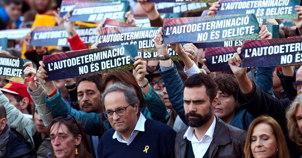 Foto: Quim Torra y Roger Torrent en la manifestación del pasado sábado en Madrid. (EFE)