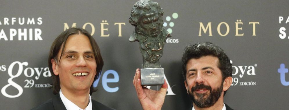 Cobos and Rodriguez hold up their Goya award for Best Original Screenplay for the film 'La Isla Minima' during the Spanish Film Academy's Goya Awards ceremony in Madrid