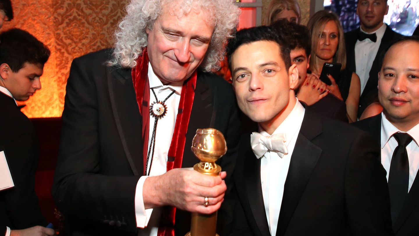 Rami junto a Brian May, guitarrista de Queen. (Getty)