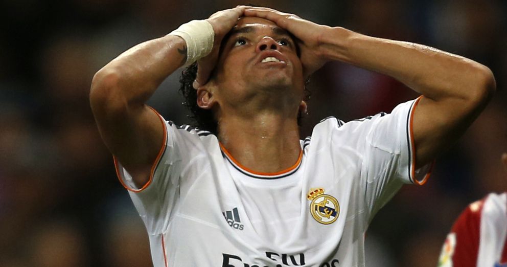 Real madrid's pepe reacts during the spanish first division soccer match against atletico madrid at santiago bernabeu stadium in madrid