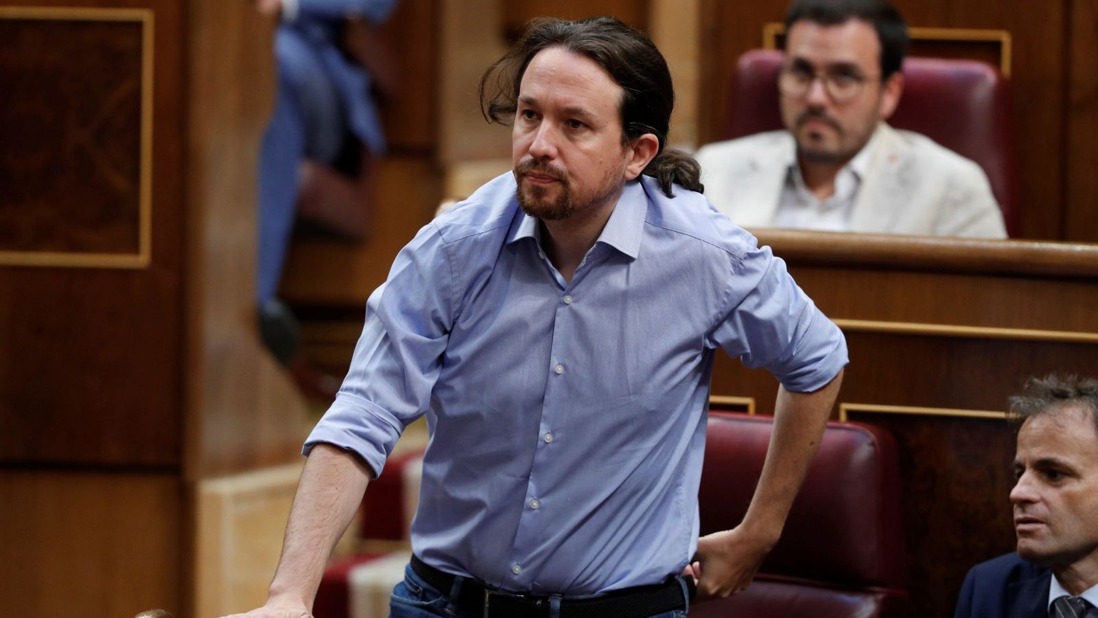 Foto: El secretario general de Podemos Pablo Iglesias, durante la segunda jornada del debate de investidura. (EFE)