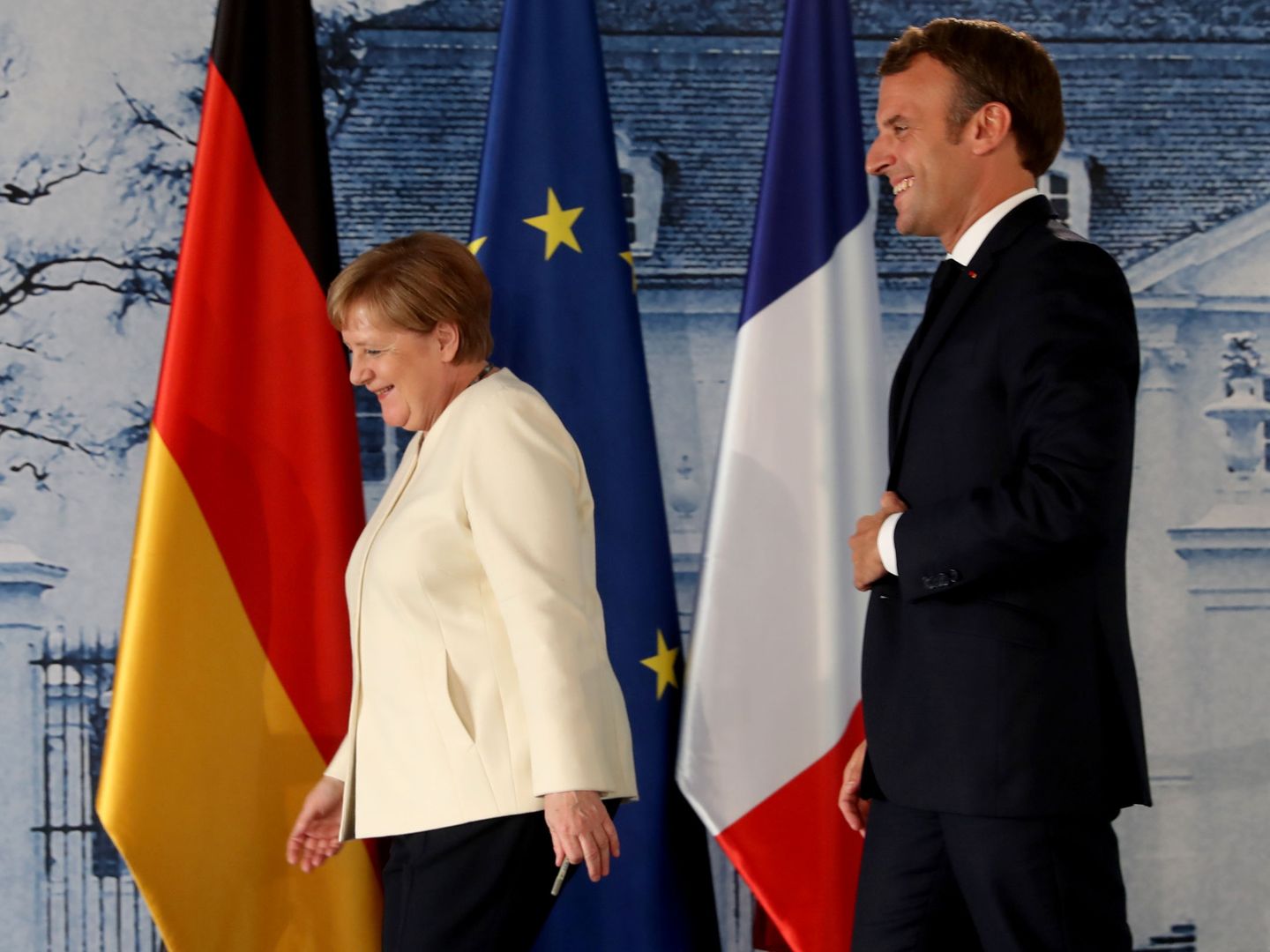 Angela Merkel, canciller alemana, junto a Emmanuel Macron, presidente francés. (Reuters)