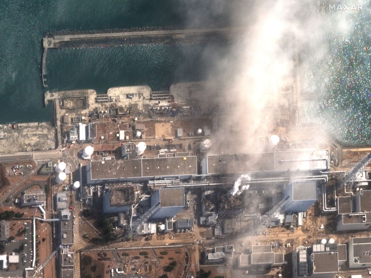 Foto de la planta de Fukushima vista desde el espacio tras su explosion en  2011. Foto: Maxar Technologies Handout via REUTERS.
