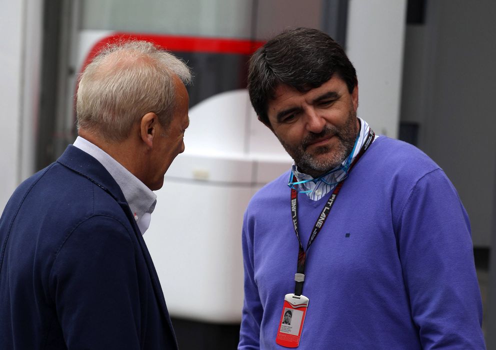 Foto: Luis García Abad conversando con Werner Heinz, manager de Nico Hulkenberg.