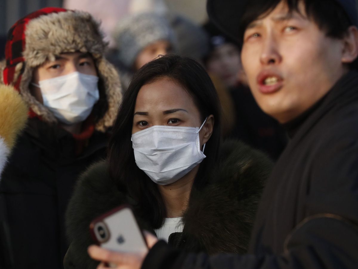 Foto: Ciudadanos chinos con mascarillas. (Reuters)