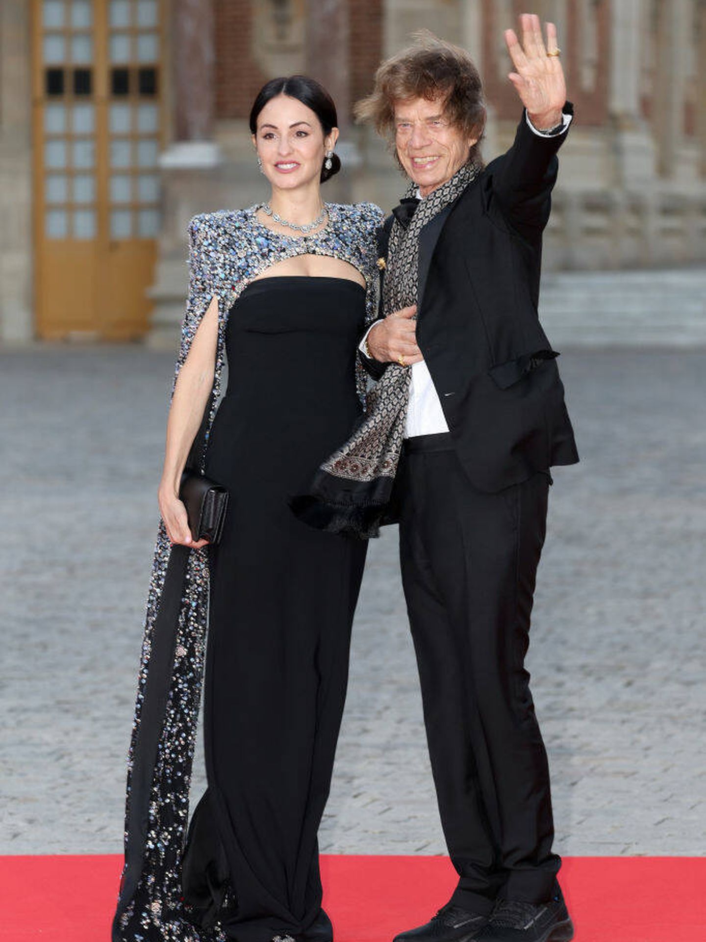 Melanie Hamrick y Mick Jagger a su llegada al palacio de Versalles. (Getty Images)