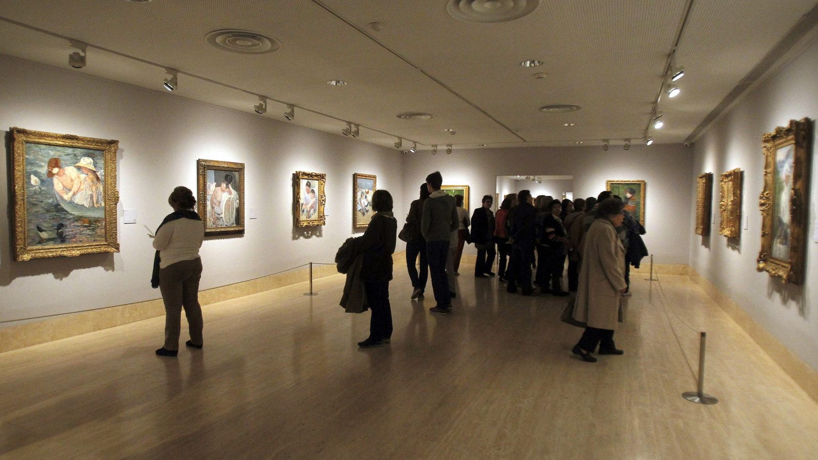 Foto: Vista general de una sala donde se exhibe la exposición 'Impresionismo Americano', en 2014. (EFE)