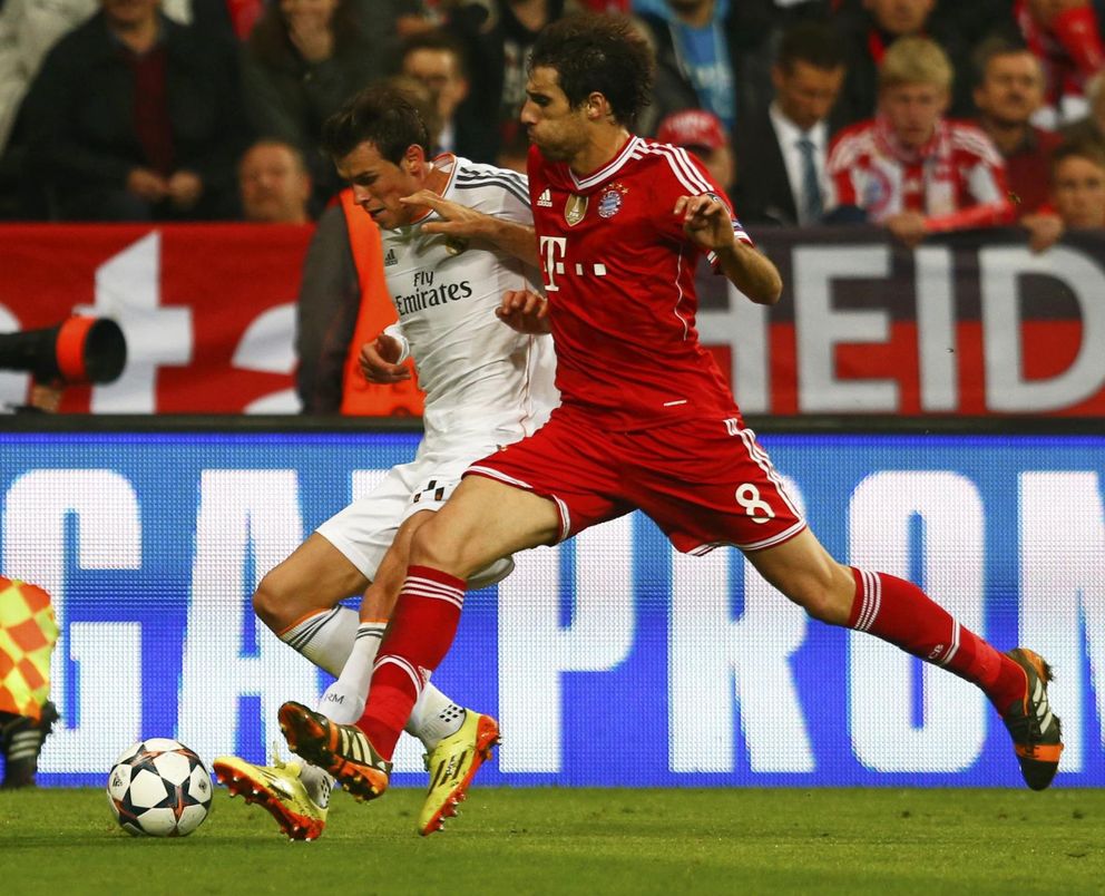 Bayern munich's martinez challenges real madrid's bale during their champions league semi-final second leg soccer match in munich
