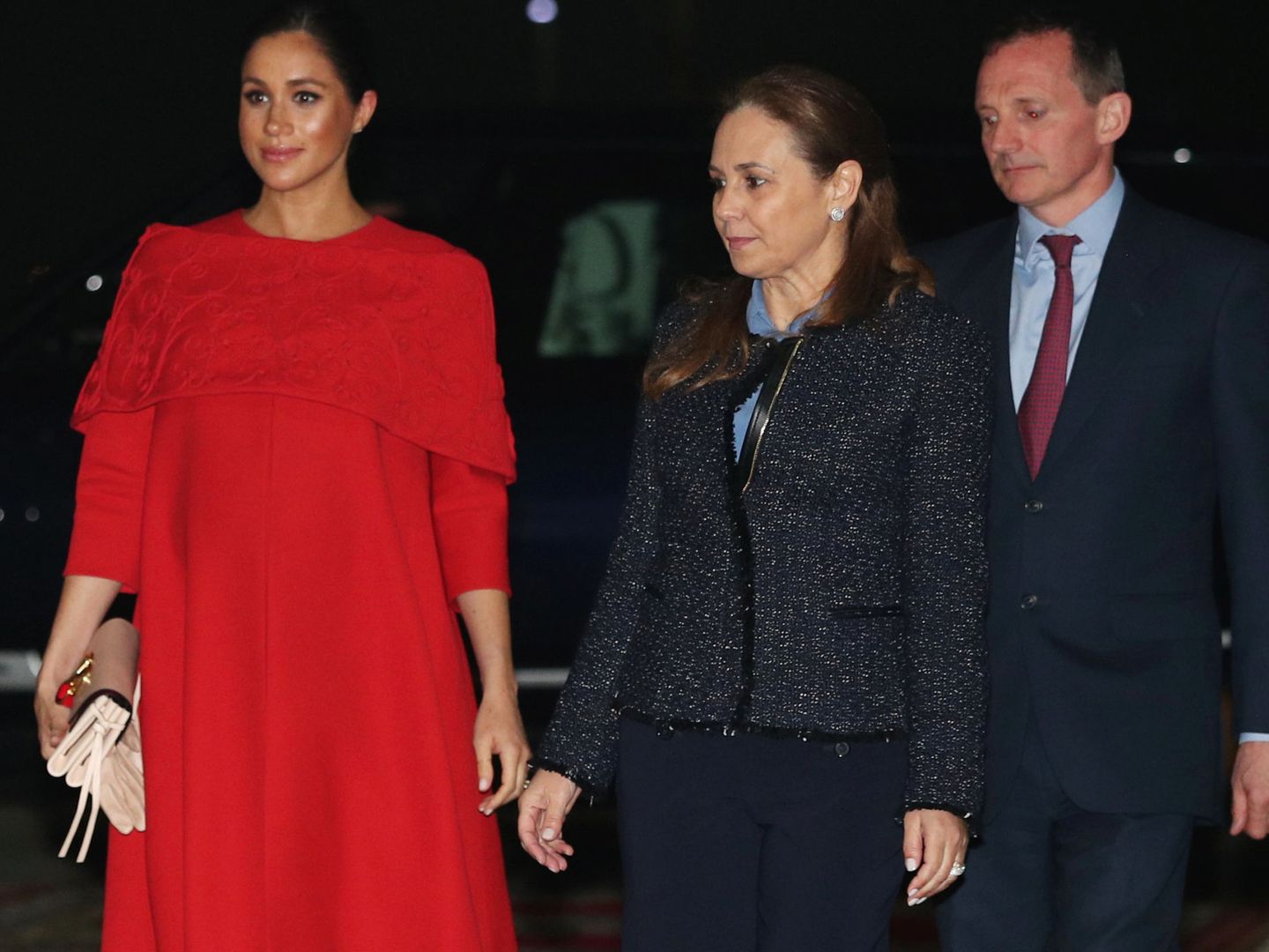 Con el embajador y su mujer. (Reuters)