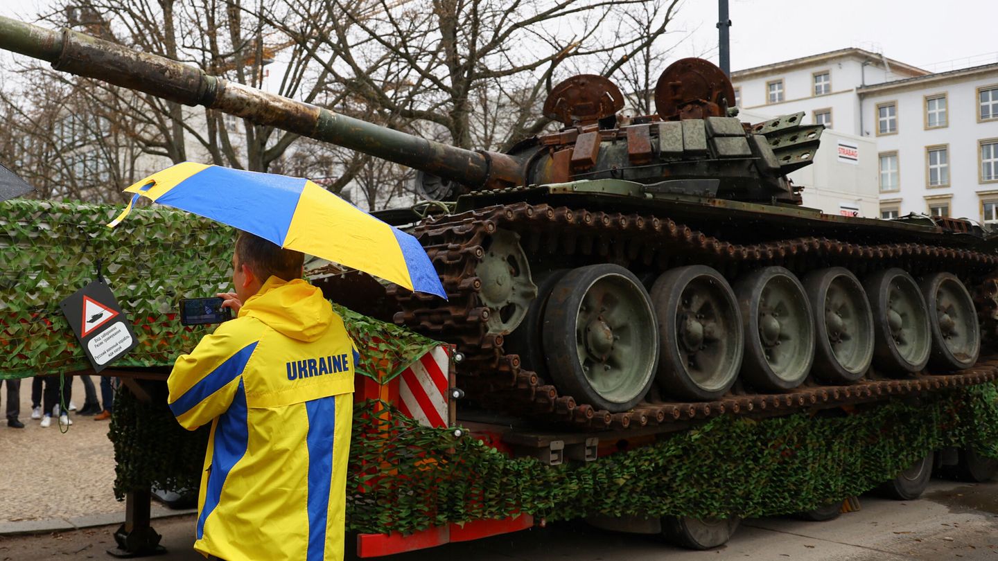 The remains of a destroyed Russian T-72 tank, secured from the Ukrainian village of Dmytrivka, outside Kyiv are on display near the Russian embassy at Unter den Linden boulevard, during an event to mark the one-year anniversary of the Russian invasion of Ukraine, in Berlin, Germany, February 24, 2023. REUTERS Fabrizio Bensch