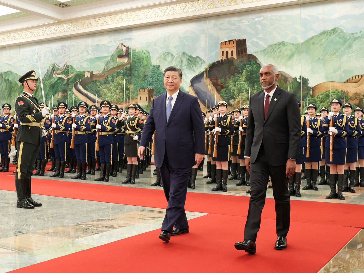 Foto: El presidente chino, Xi Jinping, junto al presidente de Maldivas. (Reuters / cnsphoto)