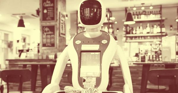 Foto: Un robot camarero sirve las mesas en un café de Hungría. (Reuters)