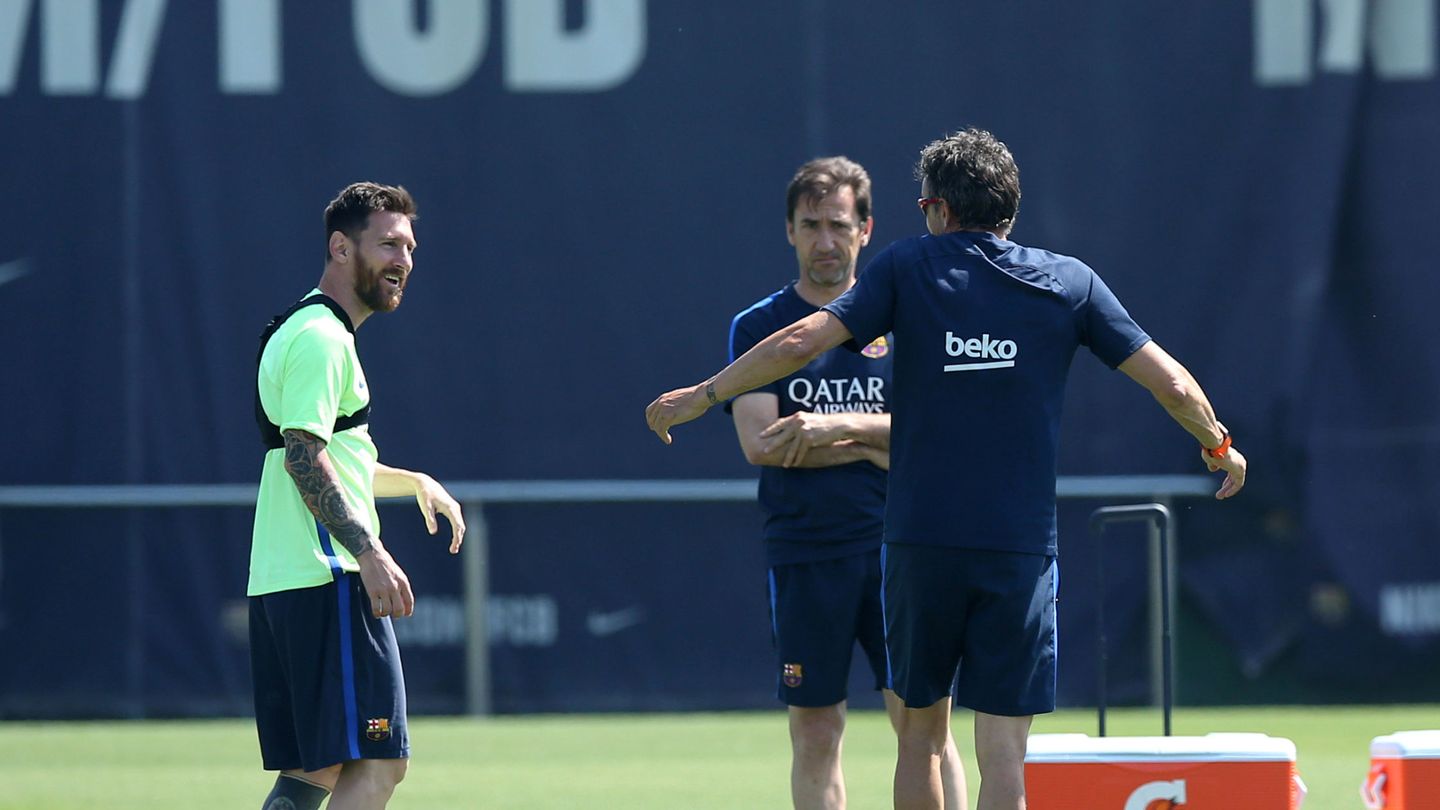 Luis Enrique con Messi. (Efe)