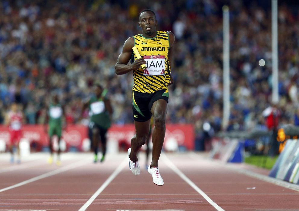 Foto: Bolt ayudó a su equipo a ganar su serie del 4x100 (EFE).