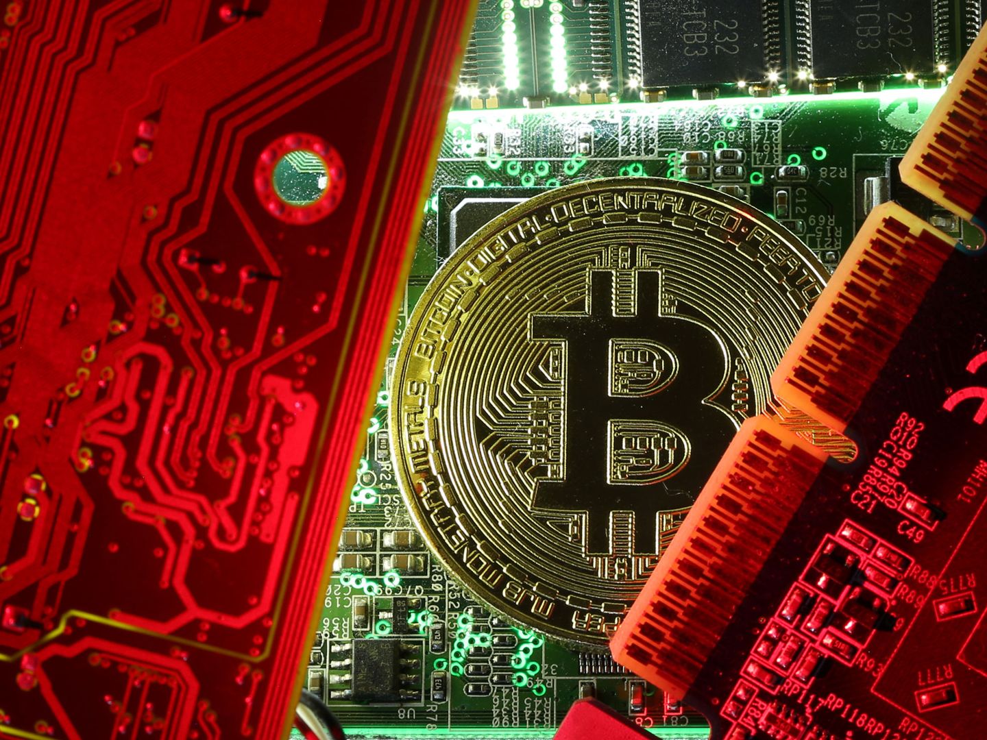 A copy of bitcoin standing on PC motherboard is seen in this illustration picture, October 26, 2017. Picture taken October 26, 2017. REUTERS Dado Ruvic