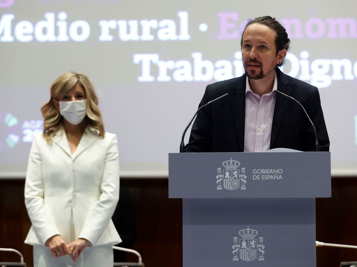 Foto: El exvicepresidente Pablo Iglesias, junto a la actual vicepresidenta segunda, Yolanda Díaz, en un acto celebrado en marzo de 2021. (EFE/Mariscal)