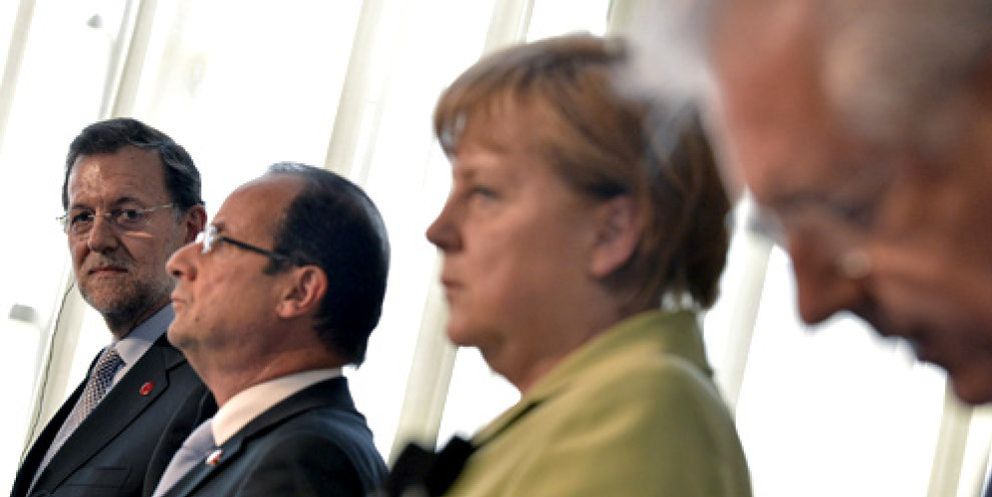 Foto: Merkel 'acepta' el crecimiento pero rechaza la inyección directa a la banca