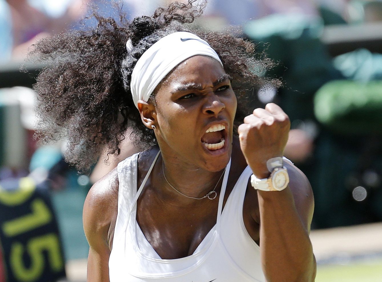 Serena williams of the u.s.a reacts after winning the first set of her women's final match against garbine muguruza of spain at the wimbledon tennis championships in london
