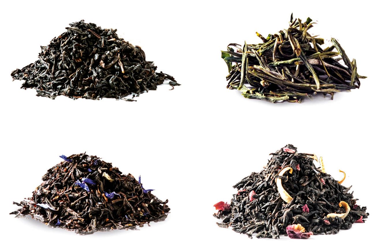 De izquierda a derecha y de arriba abajo, té chino Lapsang Souchong, té chino Huo Shan Huang Yag, té Earl Grey con bergamota aromático y té negro chino aromático. 