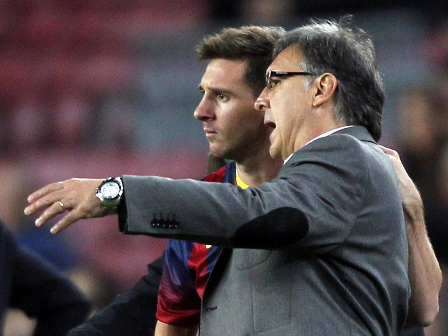 Messi y el Tata Martino, durante un partido del Barcelona. (EFE)