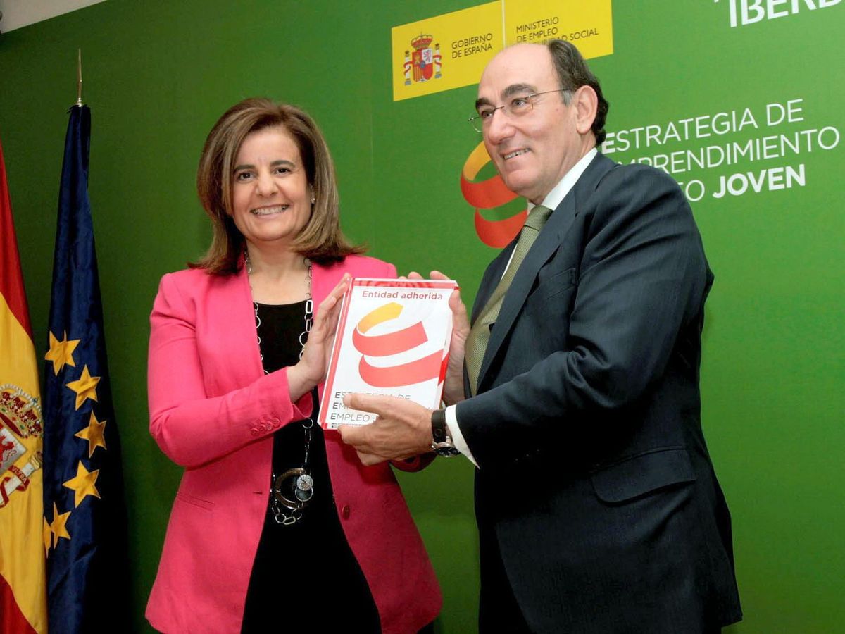 Foto: Fátima Báñez e Ignacio Sánchez Galán, en una imagen de 2013. (EFE)