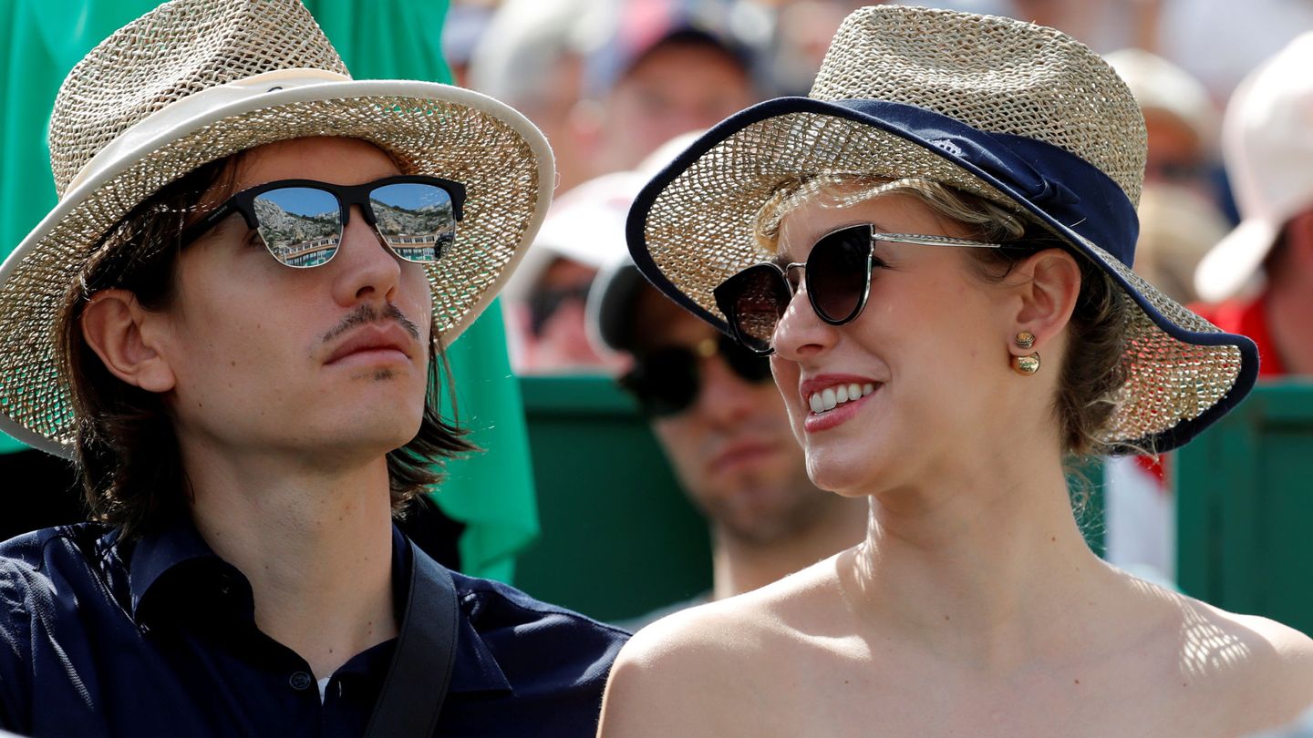 Con su novio, Ian, en un partido de tenis. (Reuters)