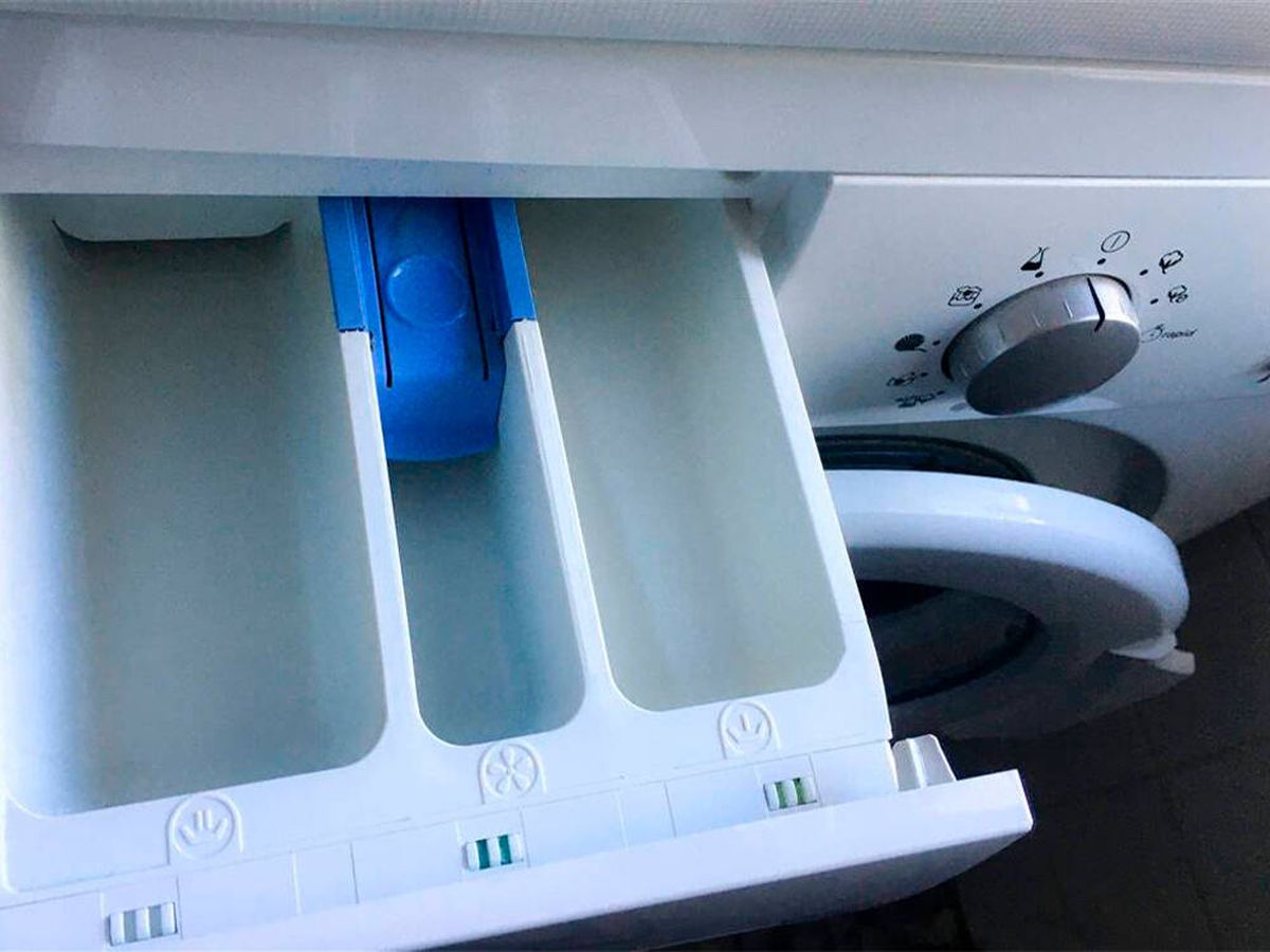 Misterio resuelto: Este es el verdadero (y muy efectivo) uso del tercer  compartimento del cajetín de la lavadora