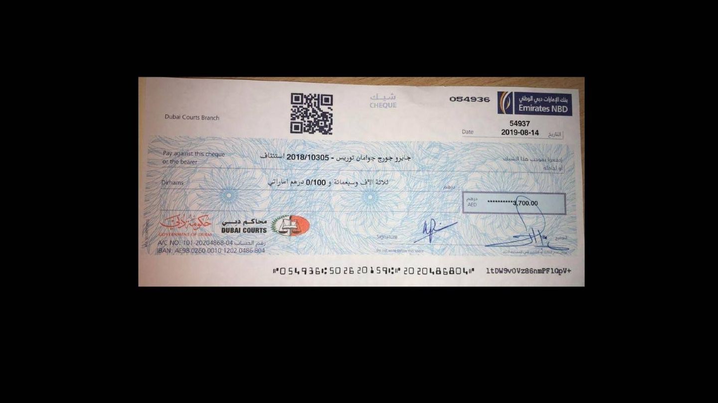 Cheque que entregaron a Jairo tras la reducción de su multa. (EC)