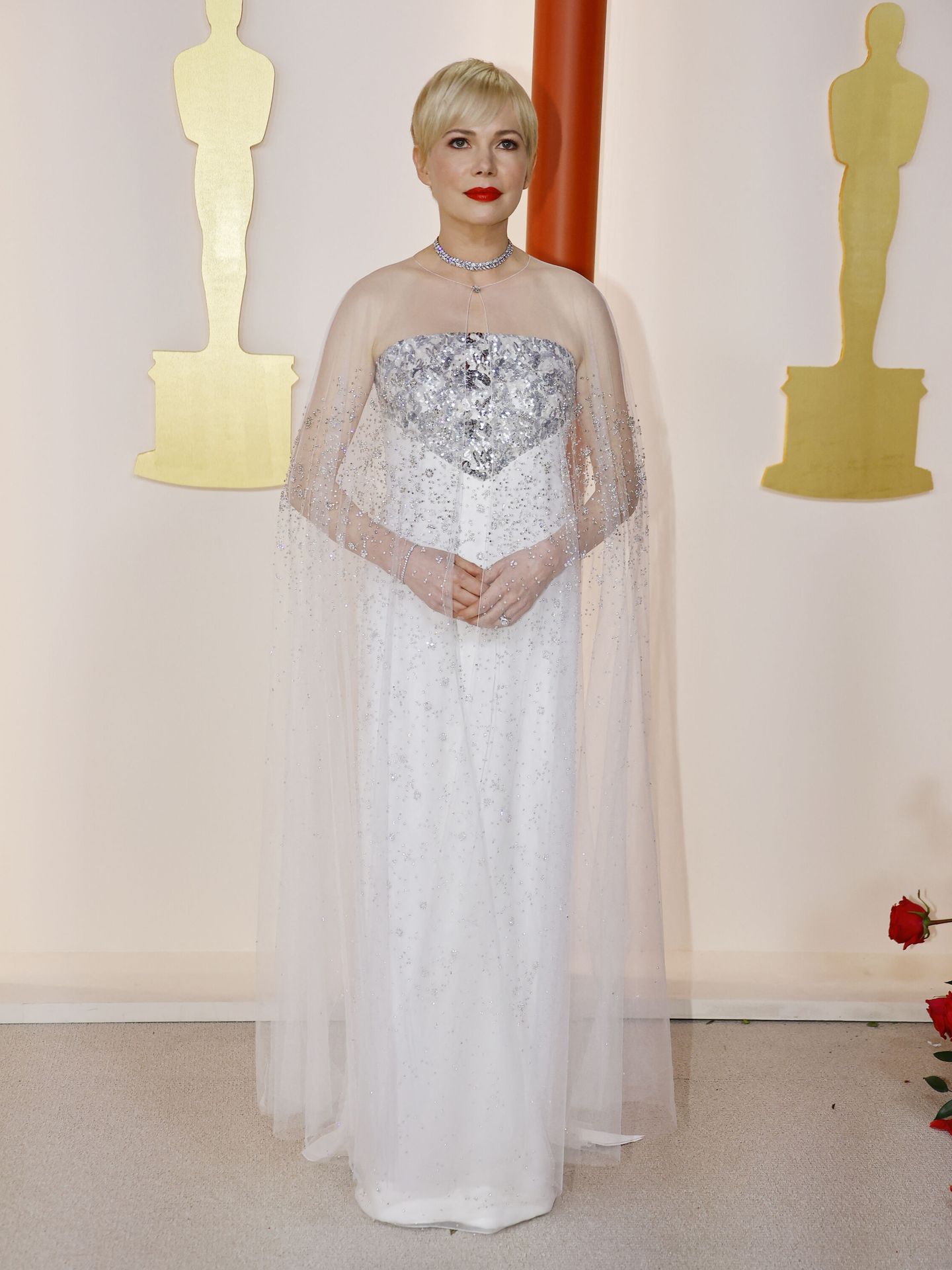 Michelle Williams poses on the champagne-colored red carpet during the Oscars arrivals at the 95th Academy Awards in Hollywood, Los Angeles, California, U.S., March 12, 2023. REUTERS Eric Gaillard