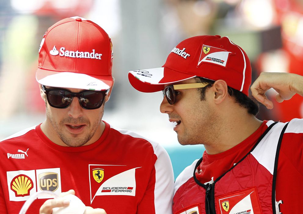 Foto: A Fernando Alonso y Felipe Massa le restan siete fines de semana para hablar vestidos de rojo.