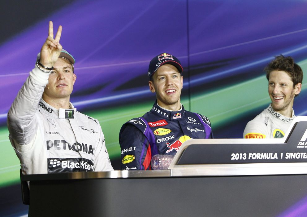 Foto: Nico Rosberg y Sebastian Vettel en el sábado de Singapur.