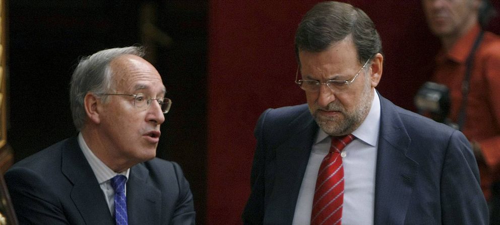 Manuel Pizarro y Mariano Rajoy (Efe)
