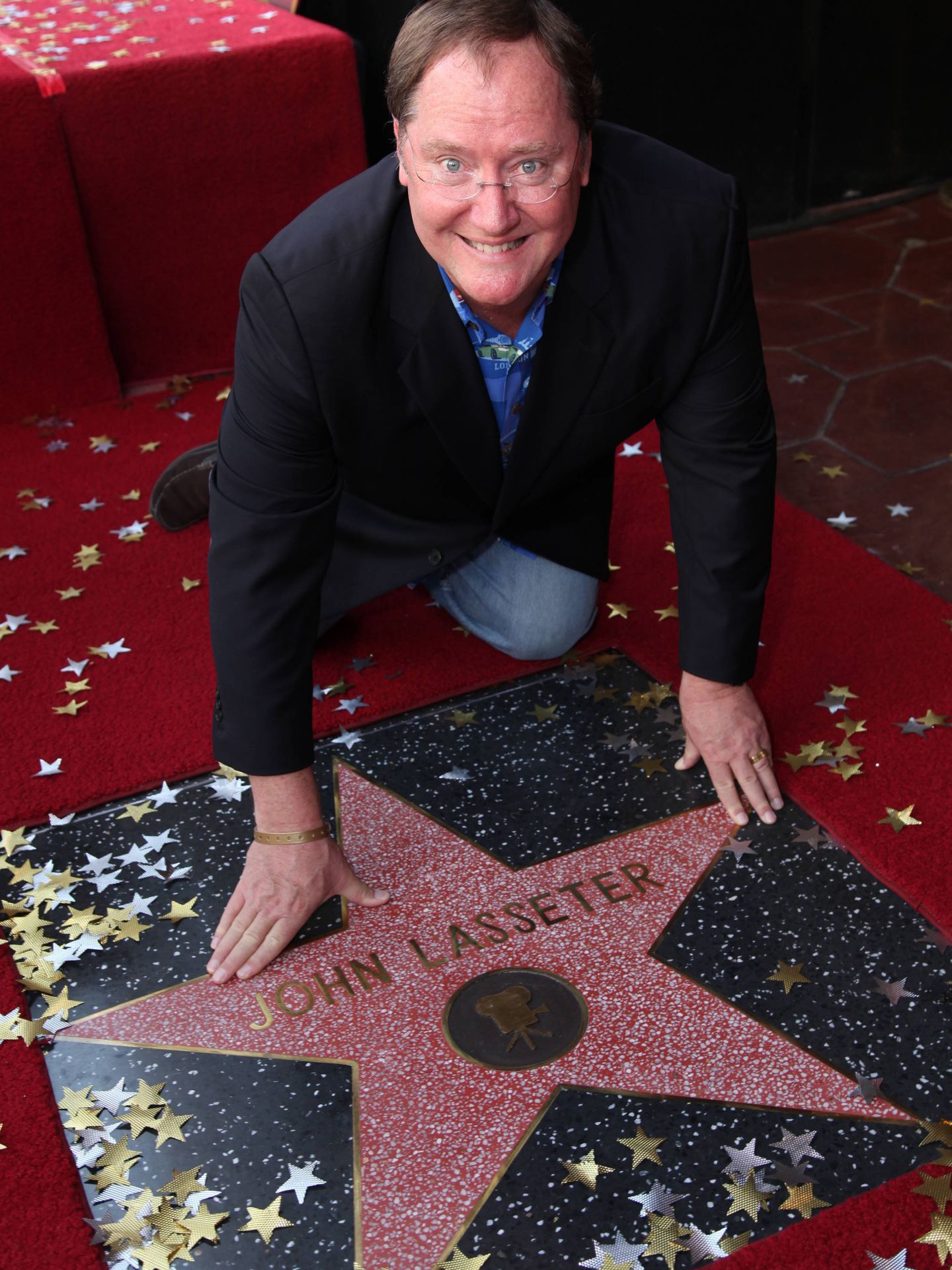John Lasseter con su estrella en el Paseo de la Fama. (Gtres)